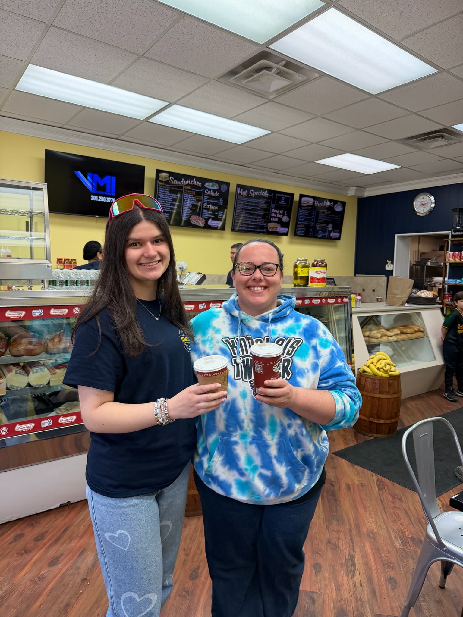 Happy guests at the deli